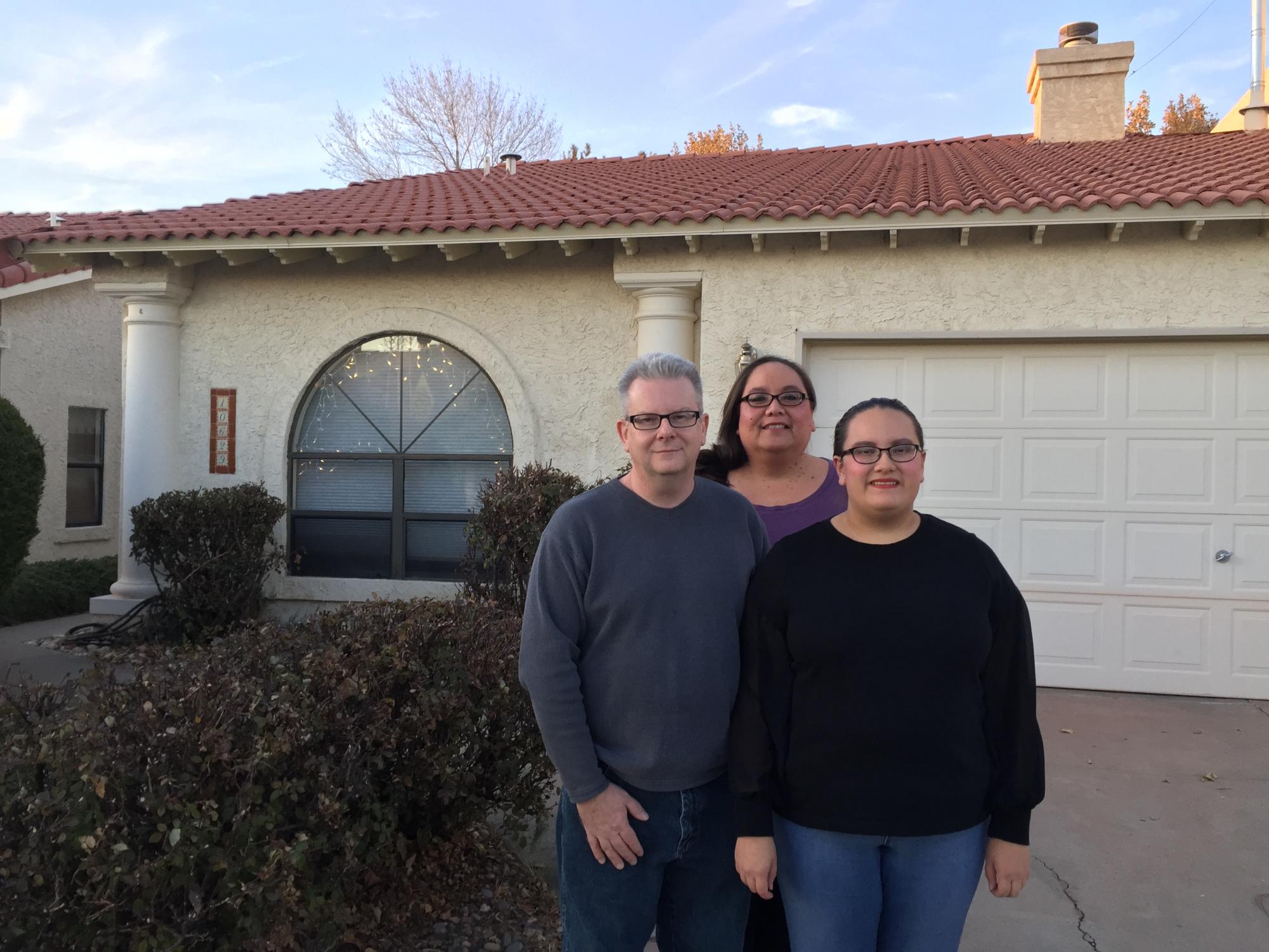 Kidman family in front of house