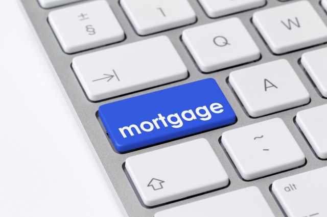 Computer Keyboard with the word mortgage on one of the keys